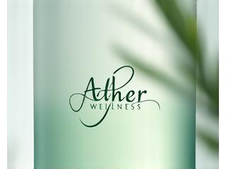 Minimalist abstract leaf logo for 'Aether Wellness', with soft green and blue hues, suggesting natural harmony and calm, on a product label.